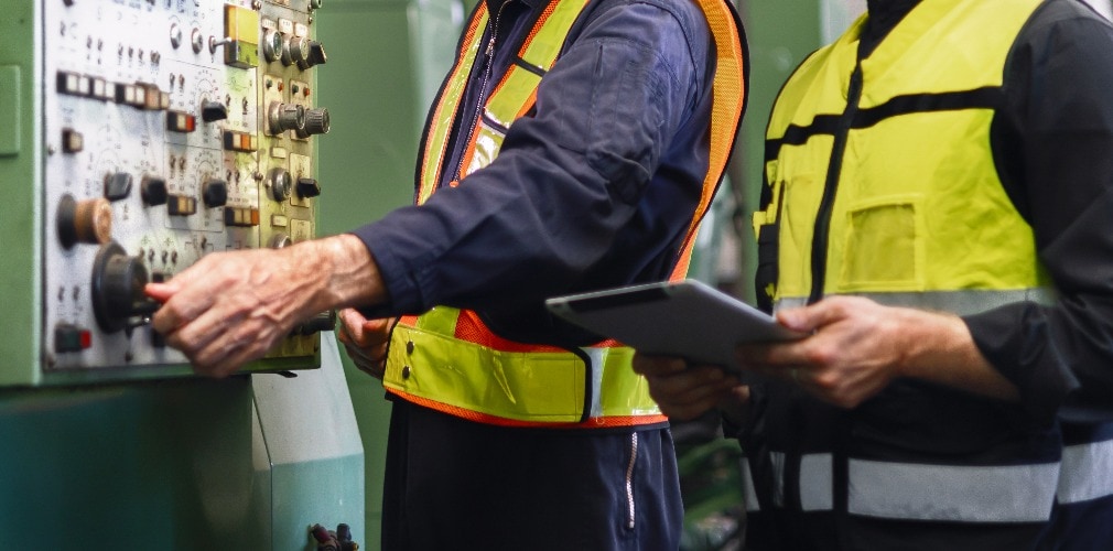 worker and engineer inspection and checking production process on factory